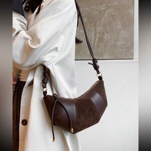 Selling this brown leathered & sued bag
Brand new